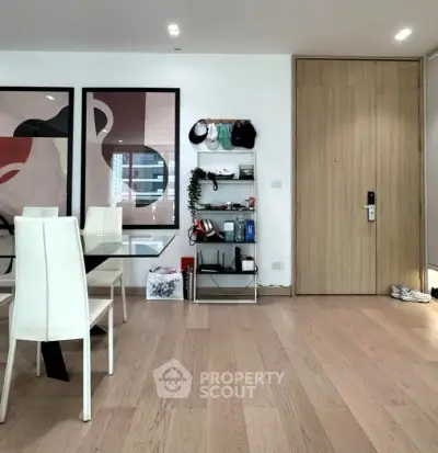 Modern living room with stylish decor and wooden flooring