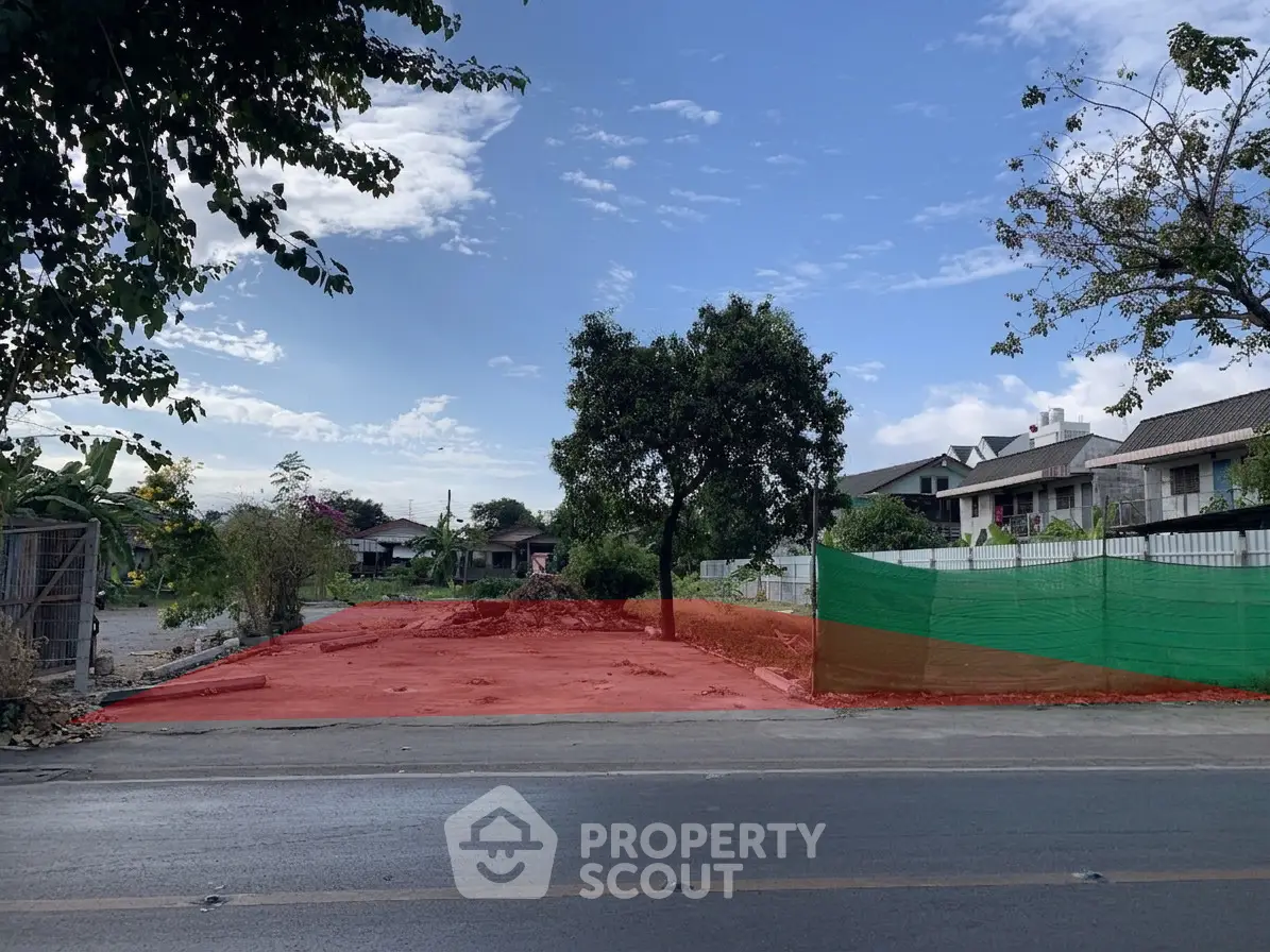 Vacant land plot with potential for development in a serene neighborhood setting.