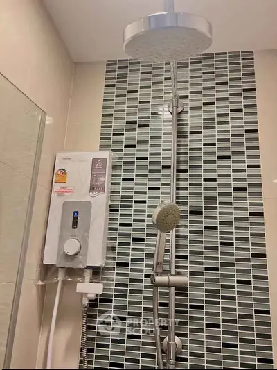 Modern bathroom with sleek showerhead and stylish tile design