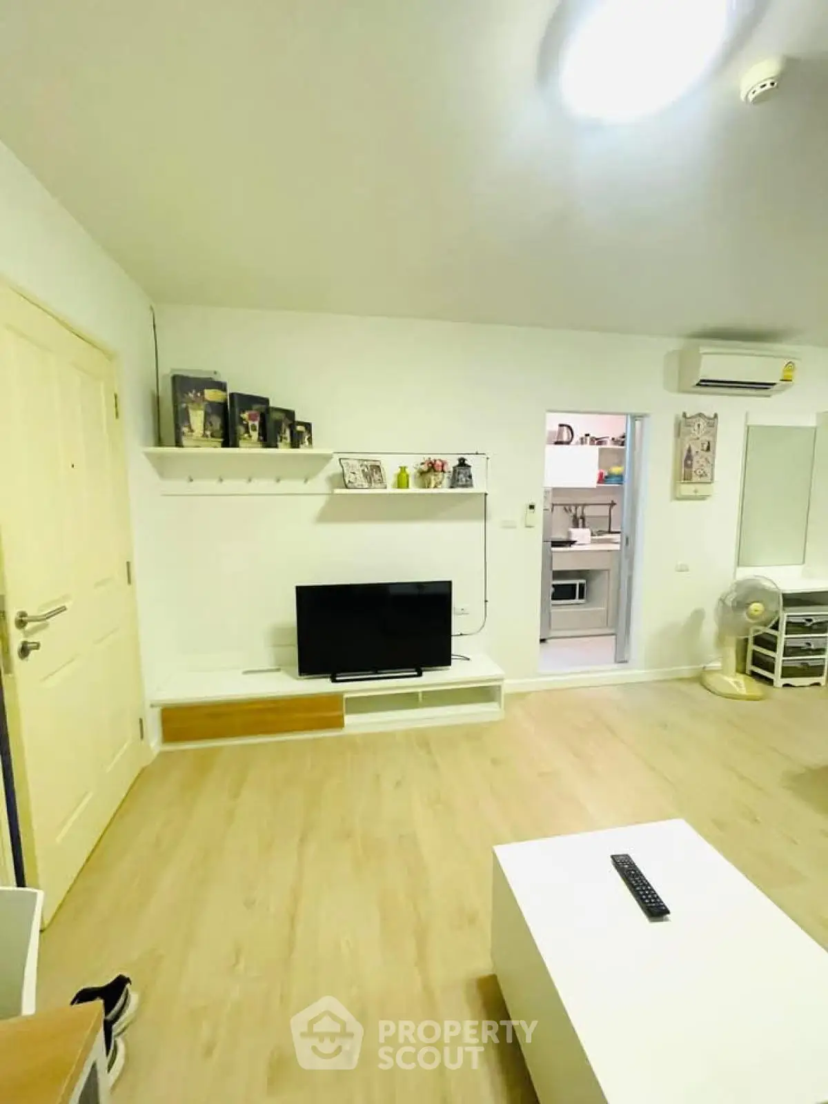 Modern living room with sleek TV setup and minimalist decor