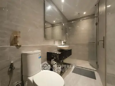 Luxurious modern bathroom with sleek fixtures and elegant marble finishes
