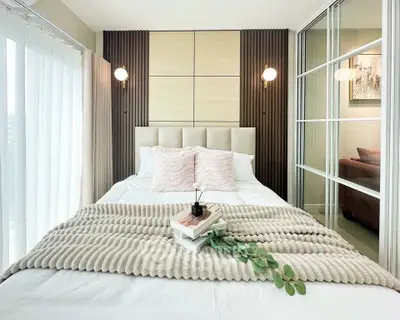 Modern bedroom with elegant decor and natural light