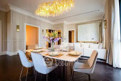 Luxurious dining room with elegant chandelier and stylish decor