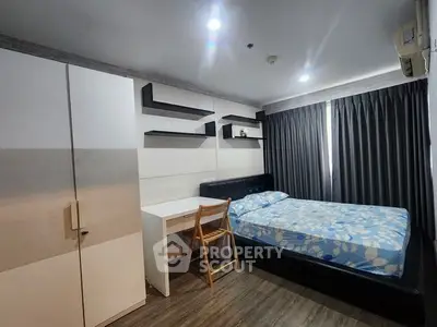 Modern bedroom with stylish decor and ample storage space