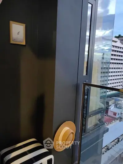 Stylish balcony with city view and modern decor, perfect for urban living.