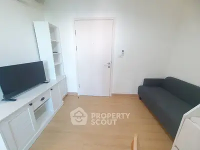 Cozy living room with modern furniture and TV setup