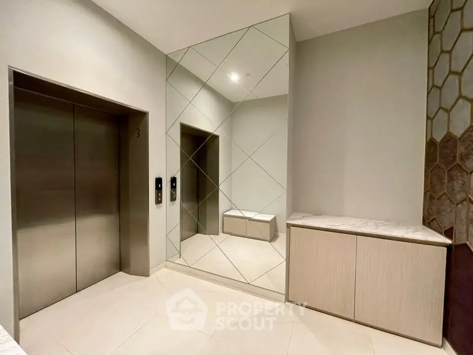 Modern building elevator lobby with stylish mirror and sleek design