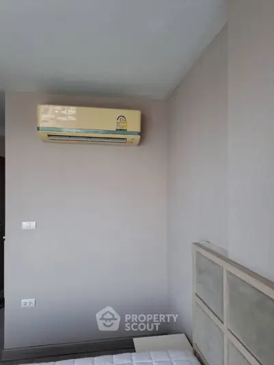 Modern bedroom with air conditioning and minimalist design