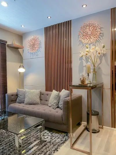 Stylish modern living room with elegant decor and cozy seating area.