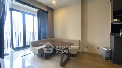 Modern living room with balcony view and sleek furniture