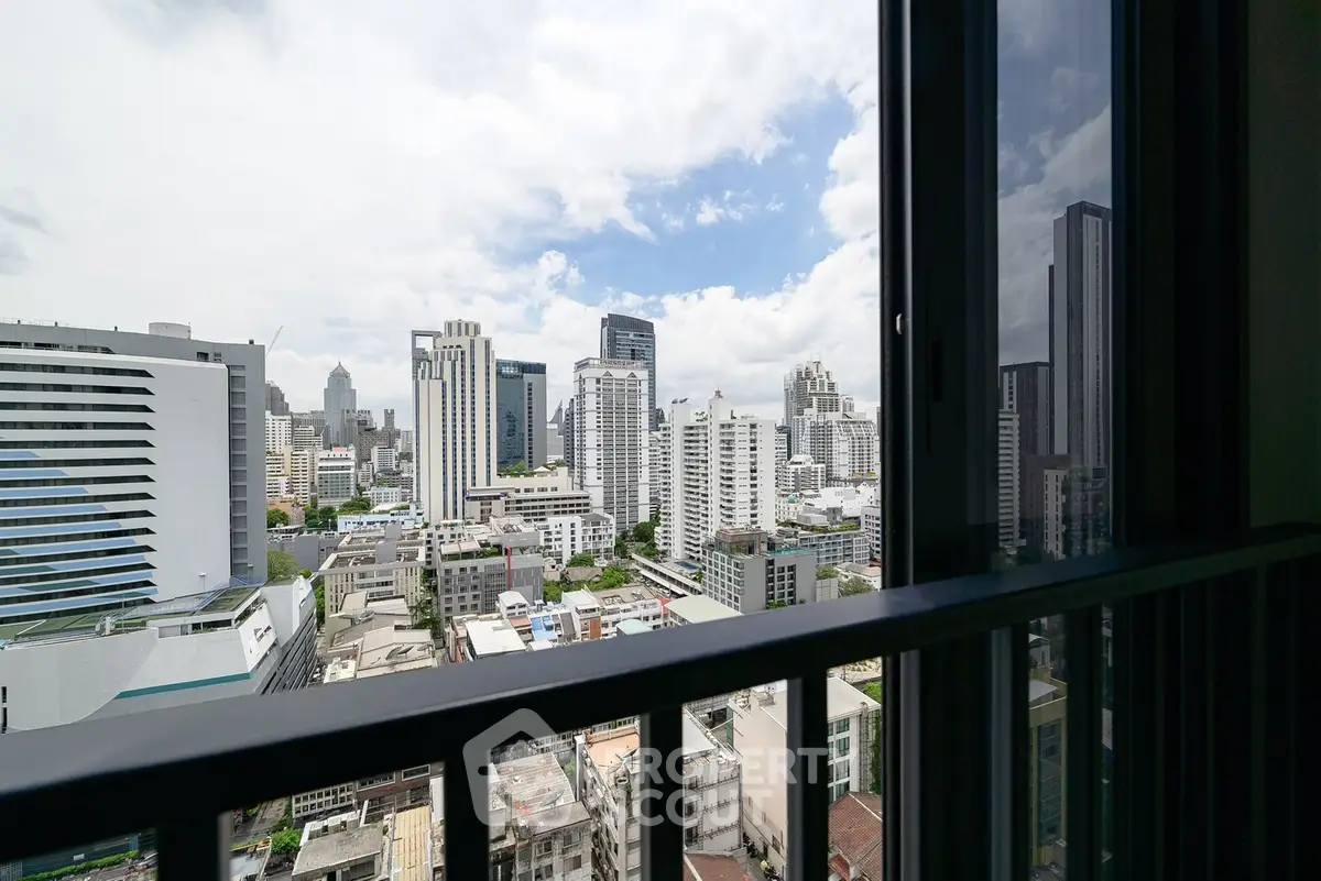 Stunning cityscape view from a high-rise balcony with modern skyline