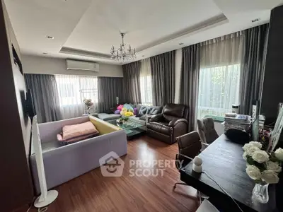 Spacious living room with elegant decor and natural light