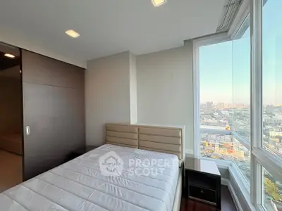 Modern bedroom with panoramic city view and sleek design