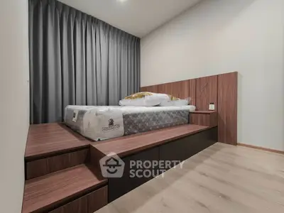 Modern bedroom with elevated platform bed and sleek wooden design