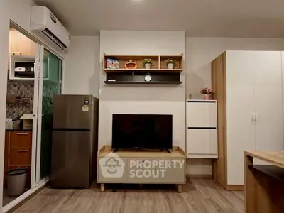 Modern living room with stylish furniture and sleek appliances