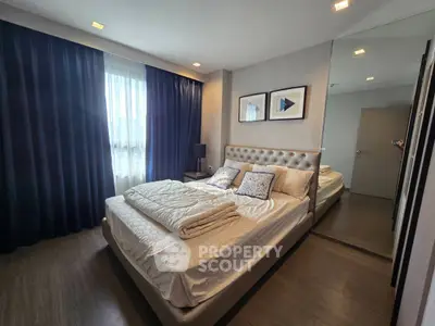Luxurious bedroom with elegant decor and plush bedding in modern apartment