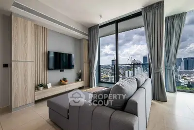 Modern living room with panoramic city view and stylish furniture