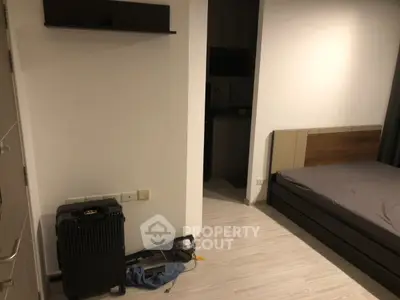 Modern bedroom with sleek design and integrated storage solutions, perfect for urban living.