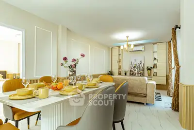 Elegant dining and living area with modern decor and stylish furniture