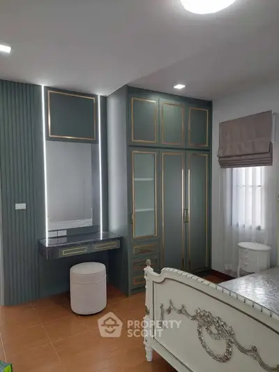 Elegant bedroom with stylish wardrobe and vanity in modern design