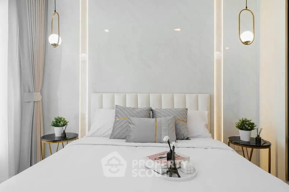 Luxurious modern bedroom with elegant decor and soft lighting, perfect for relaxation and comfort.