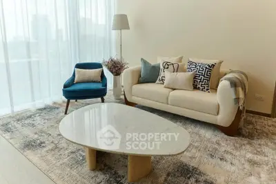 Stylish modern living room with elegant furniture and natural light