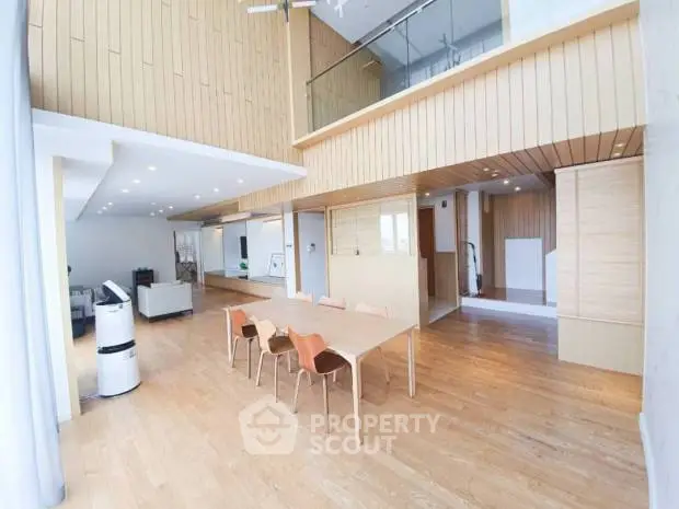 Spacious modern living room with wooden accents and open layout