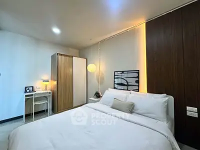 Modern bedroom with stylish decor and cozy ambiance