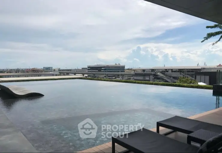 Luxurious rooftop infinity pool with stunning cityscape view
