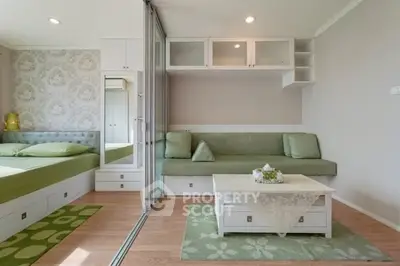 Modern studio apartment with stylish decor and sliding glass partition.