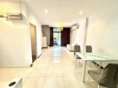 Spacious modern living room with elegant decor and natural light