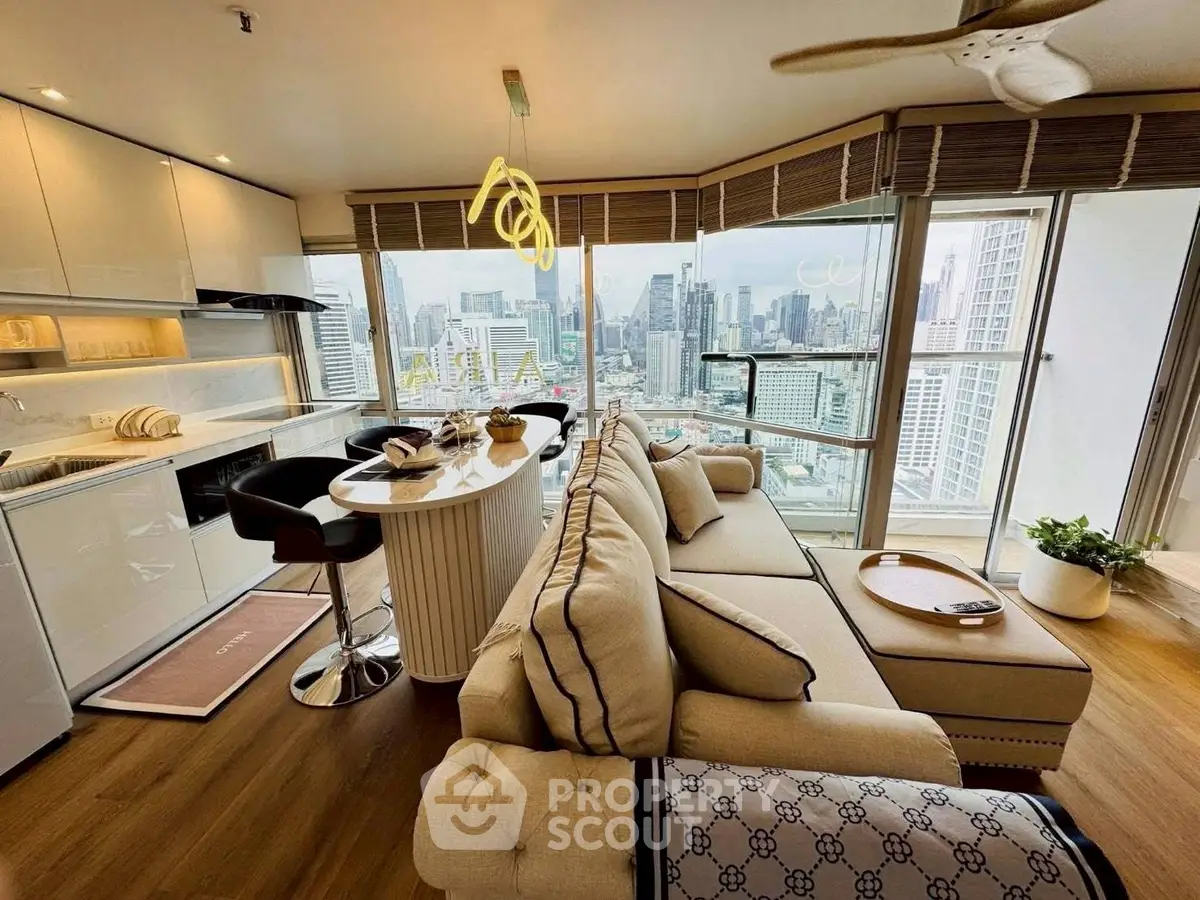 Luxurious high-rise living room with stunning city view and modern kitchen.