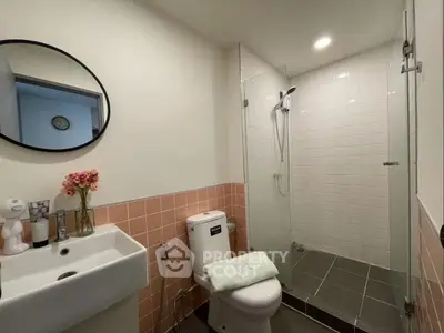 Modern bathroom with glass shower and stylish decor