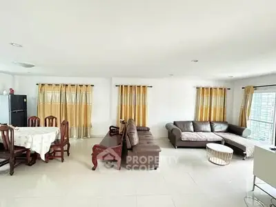 Spacious living room with elegant furniture and natural light