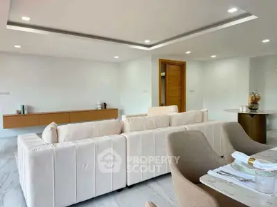 Spacious modern living room with elegant furniture and stylish decor