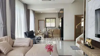 Spacious modern living room with elegant decor and open dining area