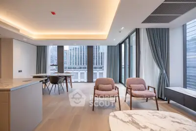 Spacious modern living room with floor-to-ceiling windows and elegant furnishings in a luxury apartment.