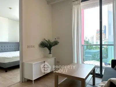 Modern living room with balcony view in urban apartment