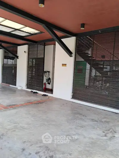 Modern building entrance with sleek design and open space