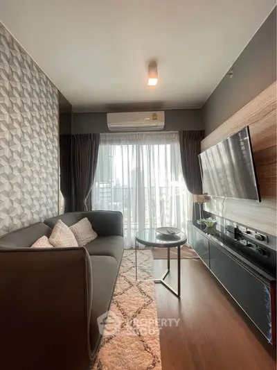 Modern living room with stylish decor and large window view