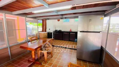 Charming kitchen with open layout and modern appliances in cozy home setting.