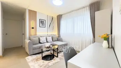 Modern living room with stylish decor and natural light
