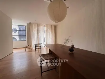 Minimalist living room with wooden floors and modern decor