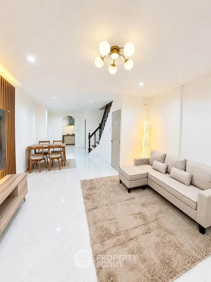 Spacious modern living room with elegant decor and open layout