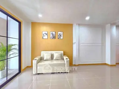 Modern living room with stylish sofa and bright decor