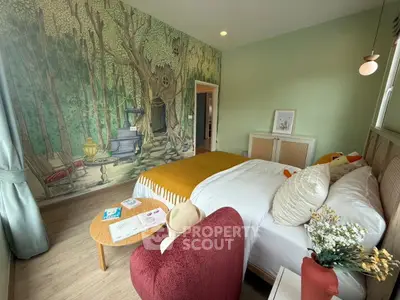 Charming bedroom with whimsical forest mural and cozy decor