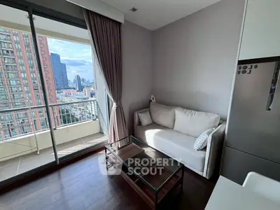 Modern living room with balcony view in high-rise apartment