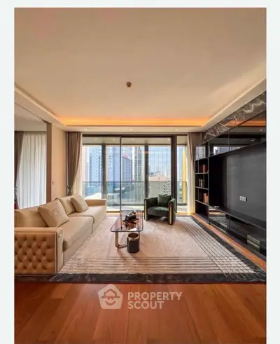 Luxurious living room with modern decor and stunning city view from large windows.