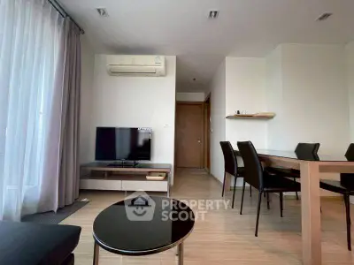 Modern living room with sleek furniture and natural light