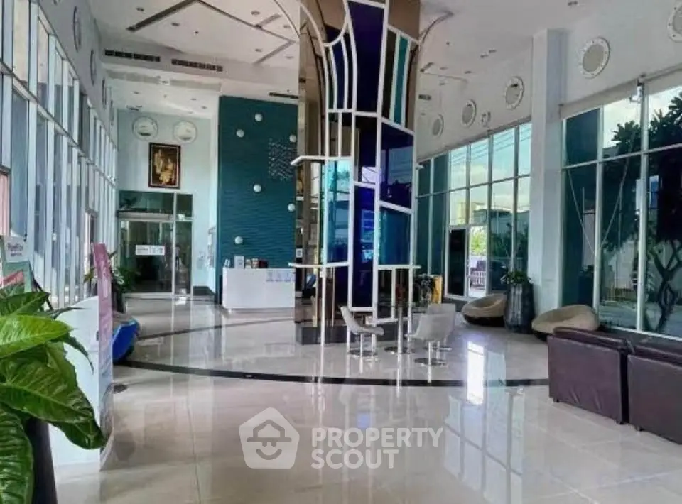 Luxurious modern building lobby with sleek design and ample natural light